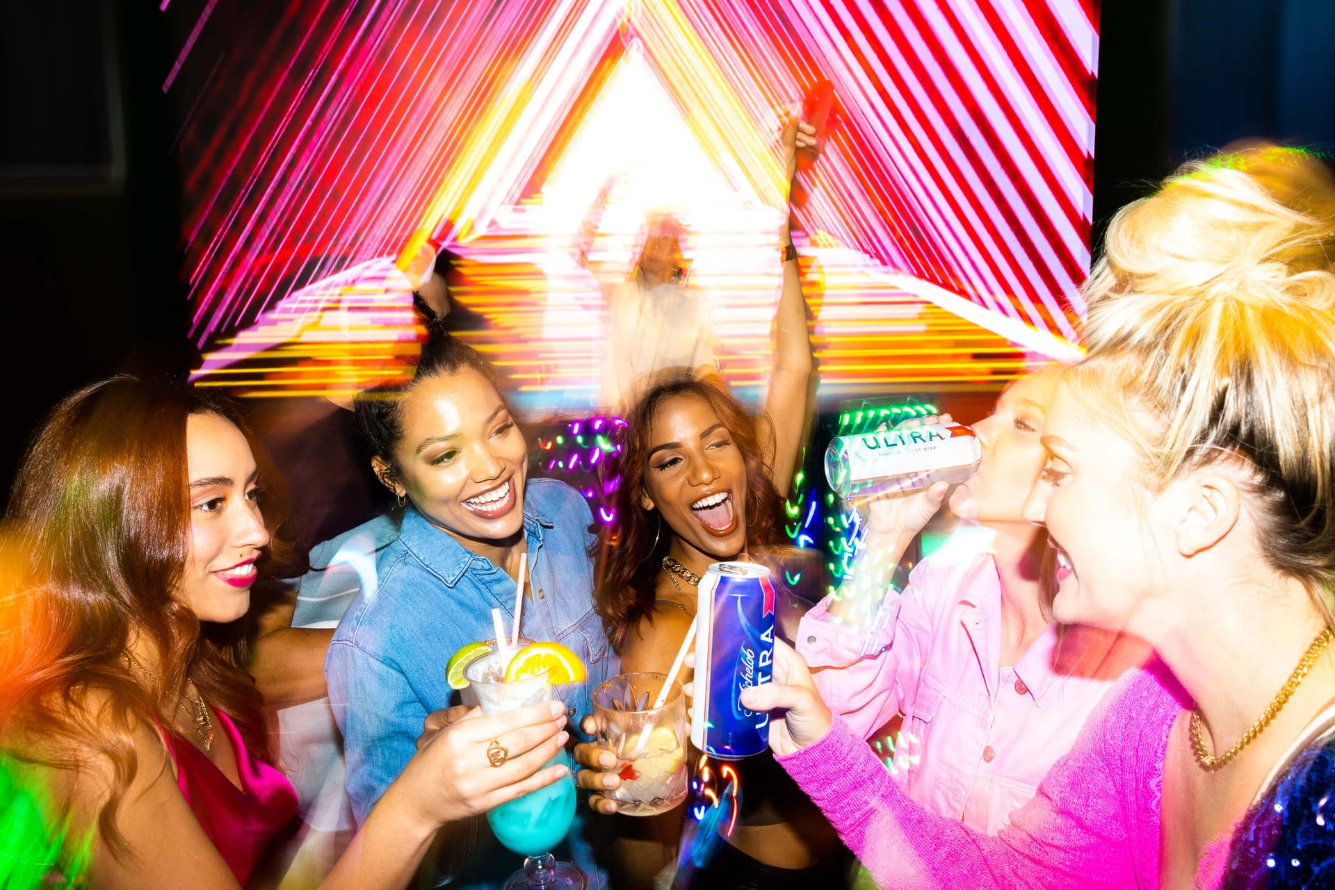 Guests celebrating a birthday with cocktails