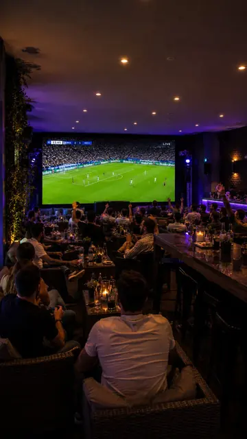 The big screen seen from the bar